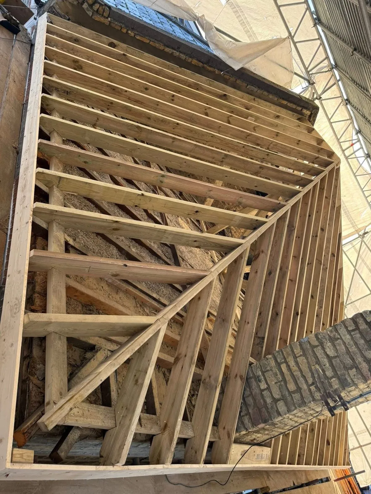 New roof timbers and rafters during a re-roof in Fowey